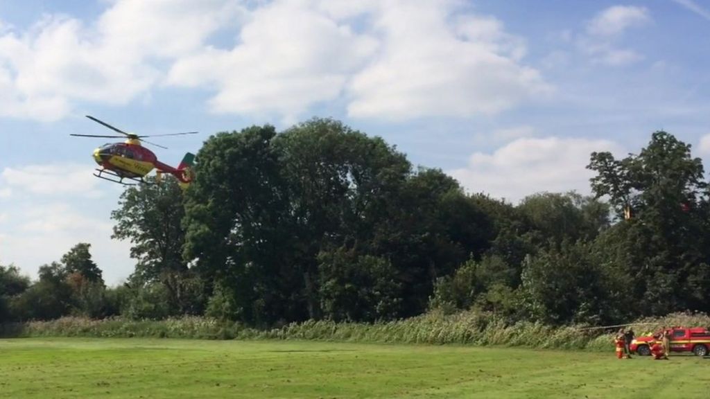 Plane crashes into trees after take-off at Salford airport