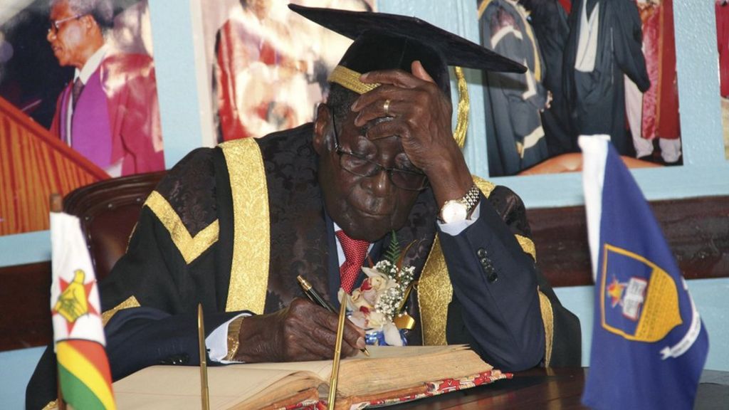 Mugabe cap row official suspended