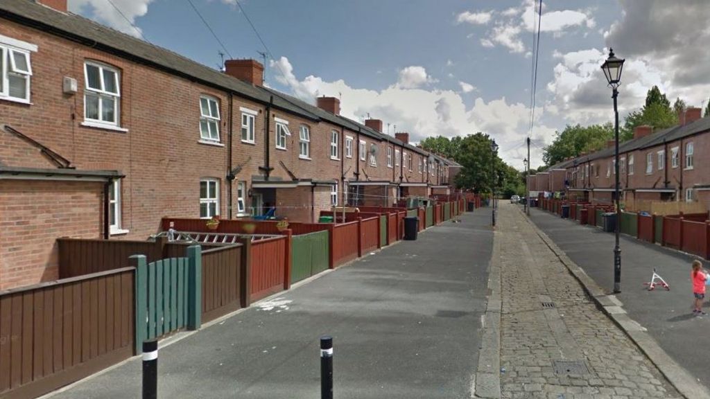 Man found on Hulme street with head injury dies