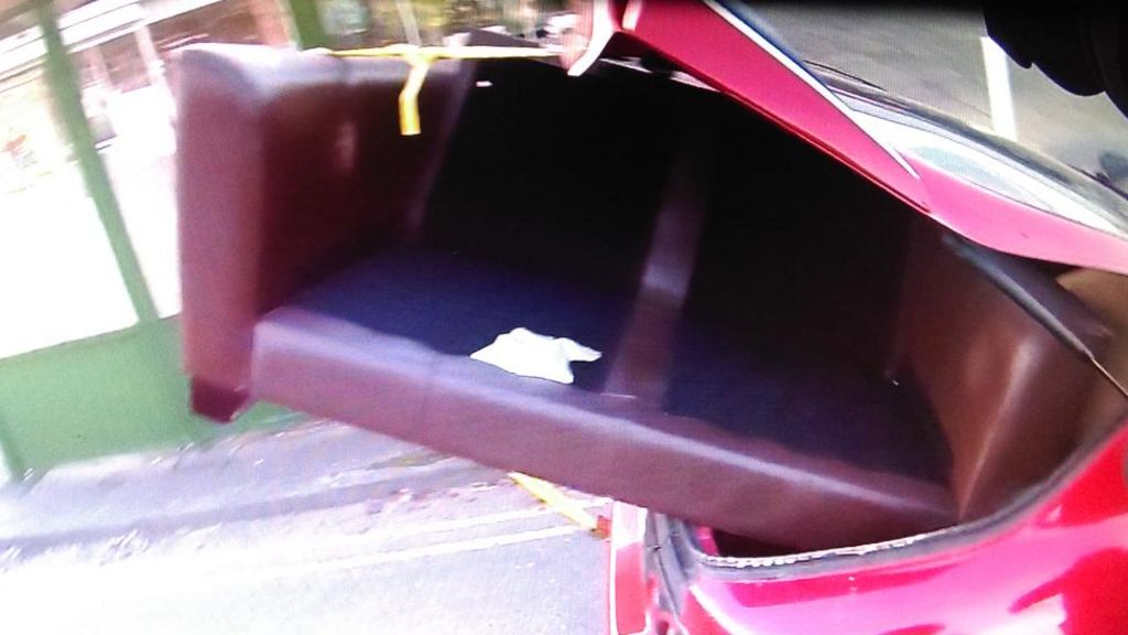 Motorist stopped over sofa sticking out of boot - BBC News