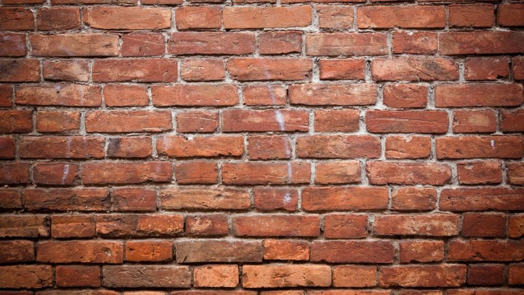 Man's front door bricked up as he sleeps