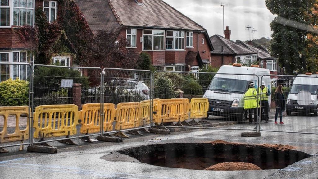 Huge sinkhole caused by collapsed sewer in Prestwich closes road