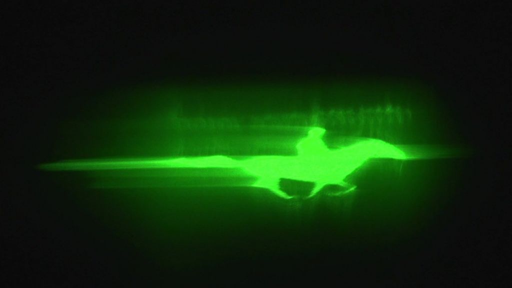 Moving image of horse projected on clouds above Nottingham - BBC News