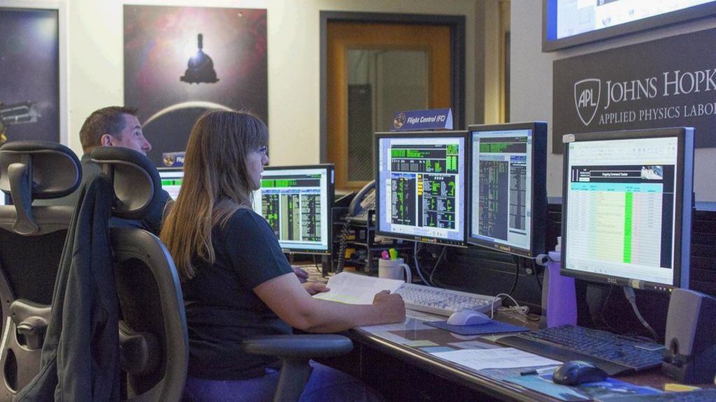 Probe refines Pluto flyby path