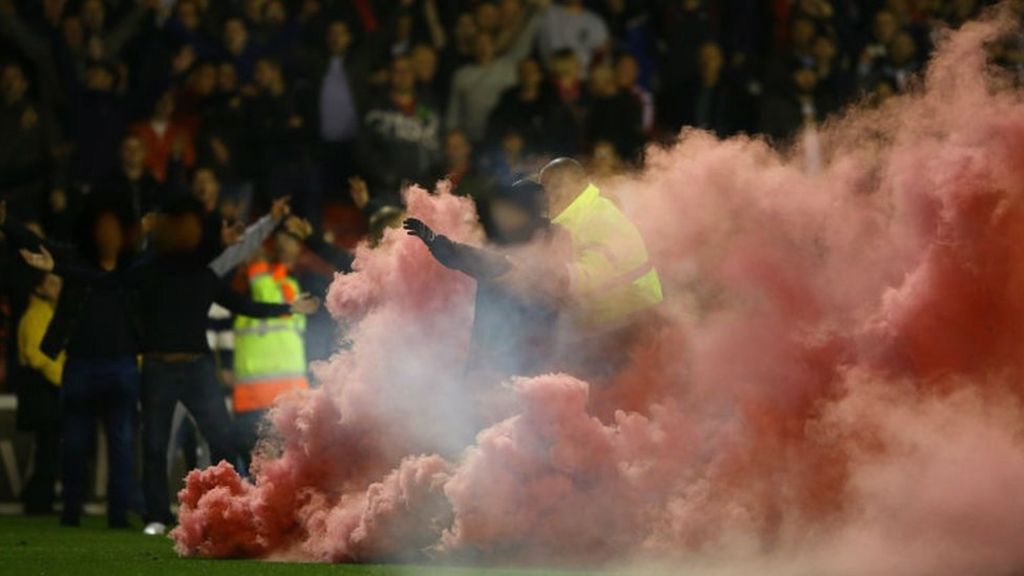 Forest fan banned for pitch invasion