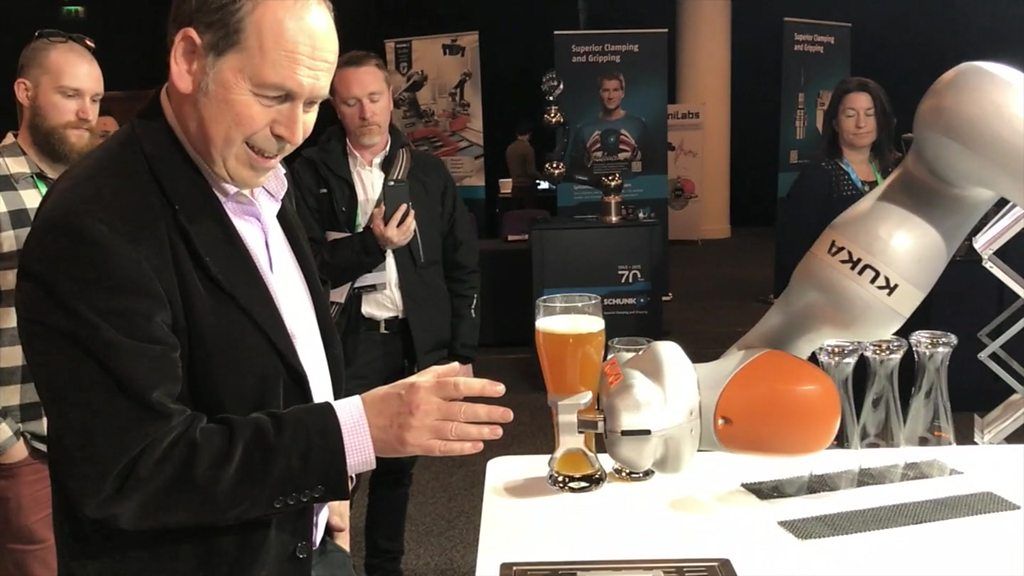 Robotic barman pours a pint - eventually
