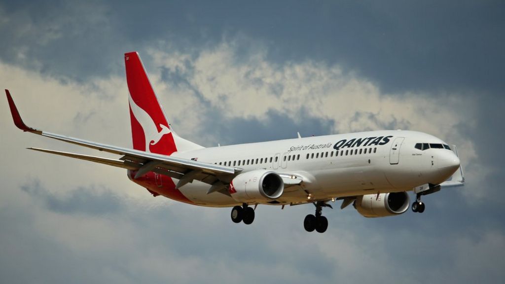 Qantas airline soars to record profit after restructuring