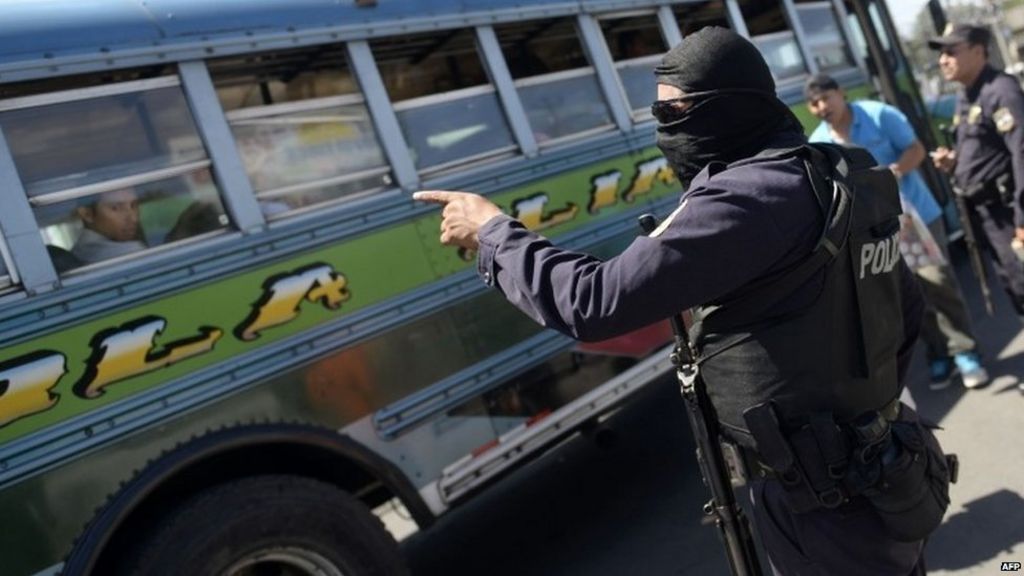 Soldiers guard El Salvador buses