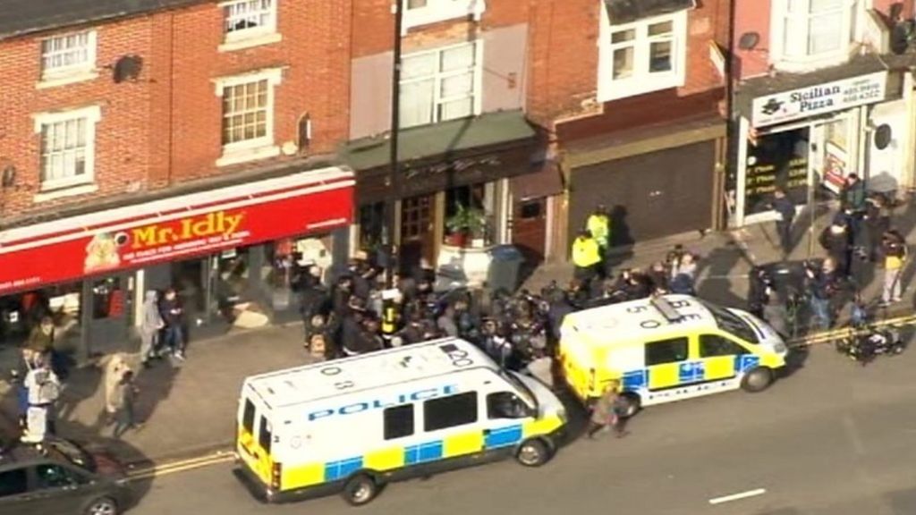 London attack: Police raids in Birmingham as killer named