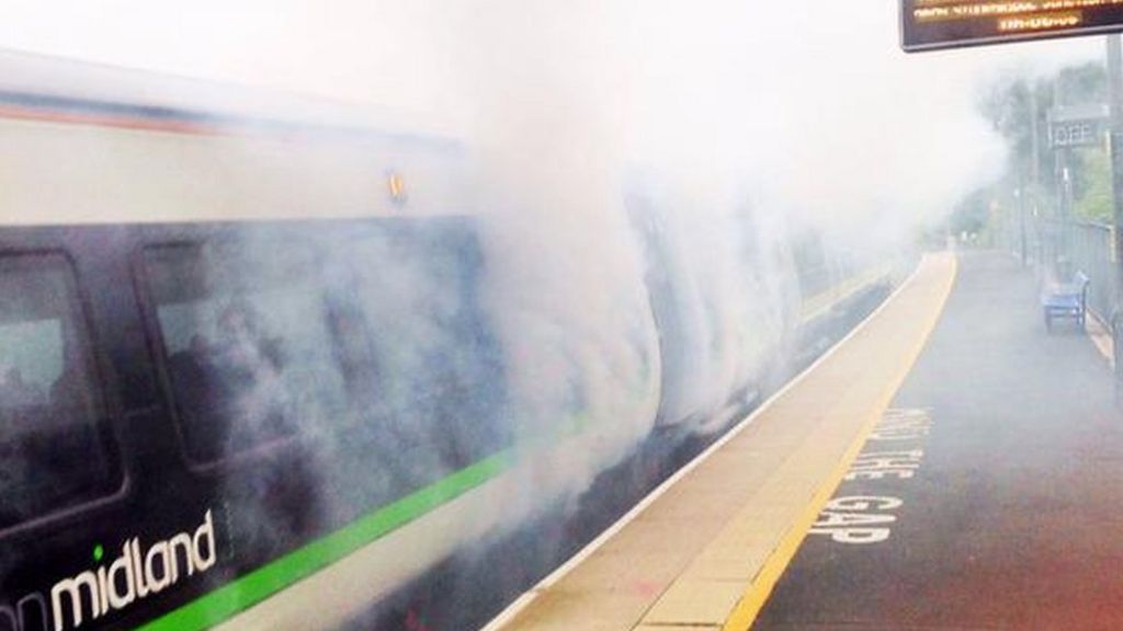 Train fire at station sparks delays