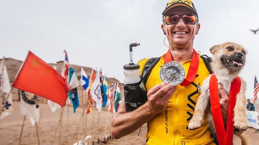 Stray dog joins extreme runner during China race