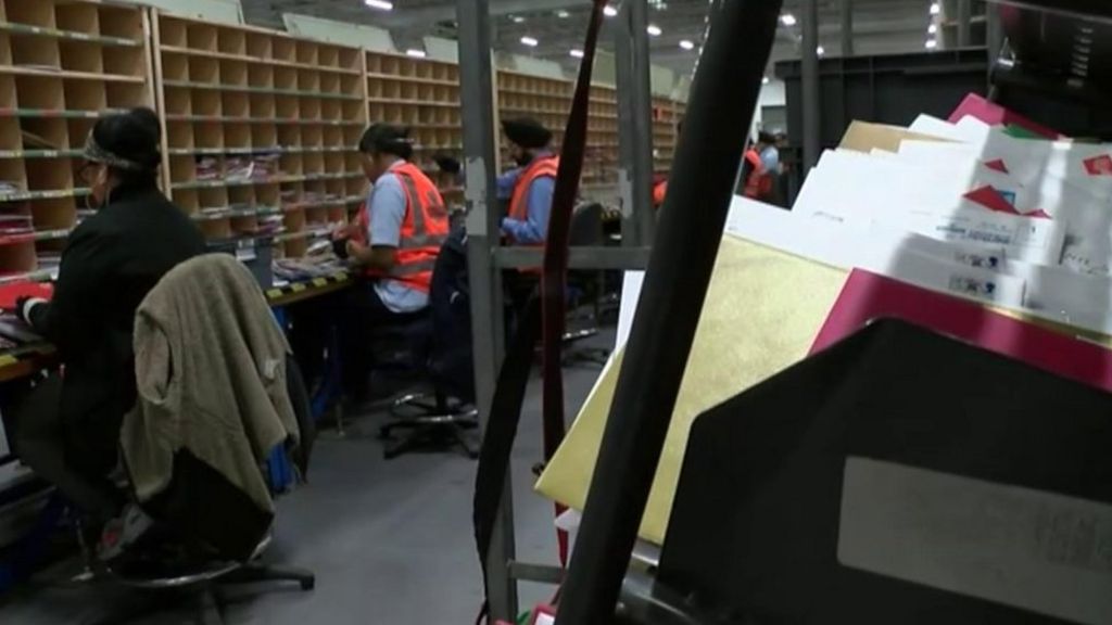 Christmas card and parcel pile grows by millions at sorting office