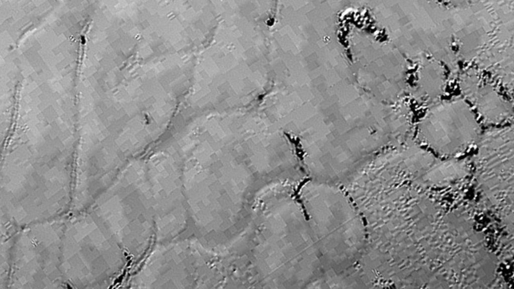 Probe zooms into Pluto's plains