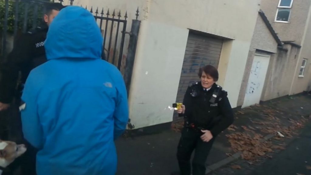 Police taser race group founder in the face