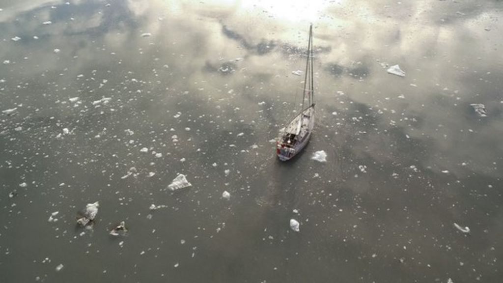 Yacht sails through low-ice Arctic sea routes