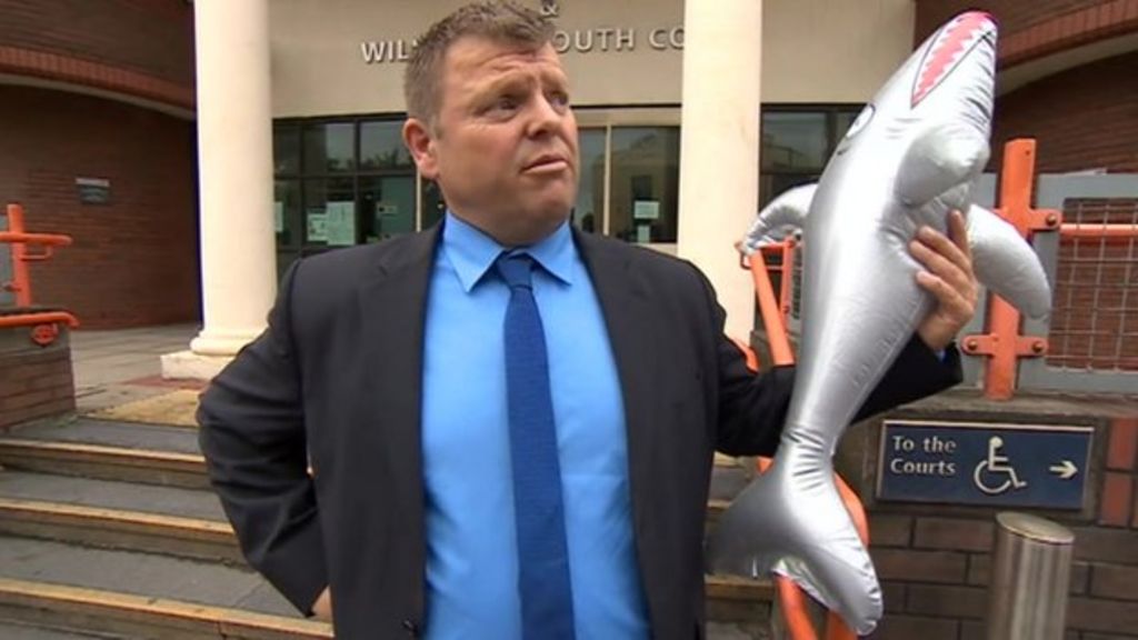 Inflatable shark attack fan guilty