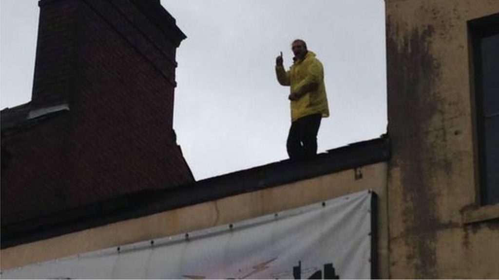 Ducie Bridge pub: Rooftop protest as bailiffs try to clear squatters