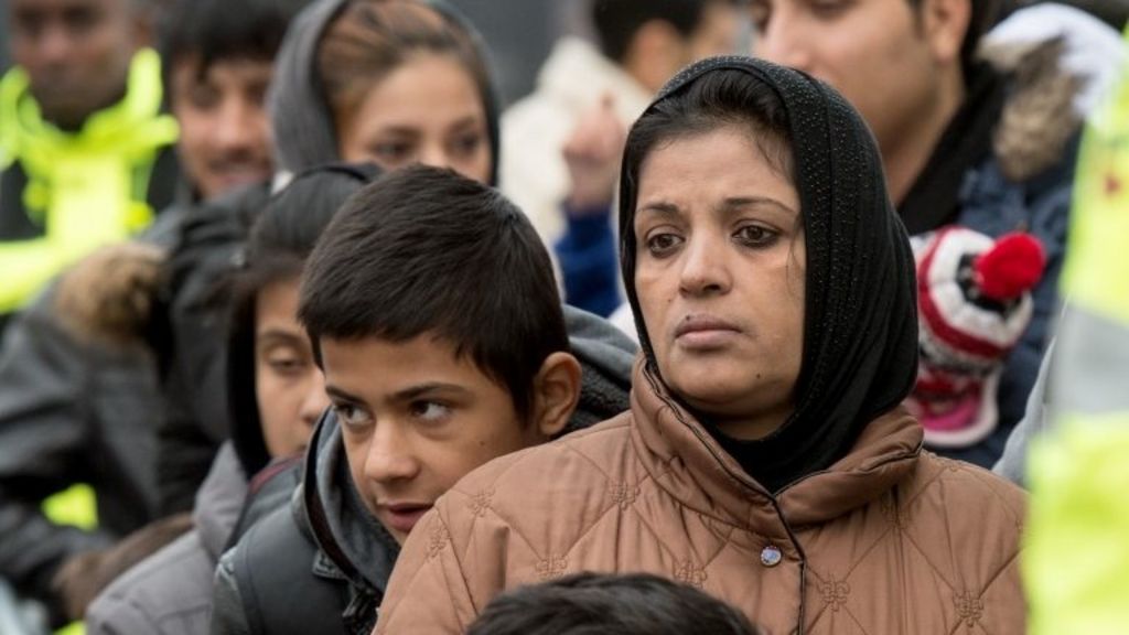 Merkel: Migrant crisis 'historic test'