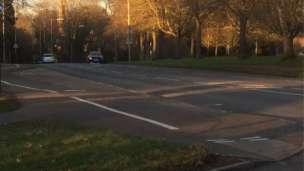 Woman hit by police car seriously hurt