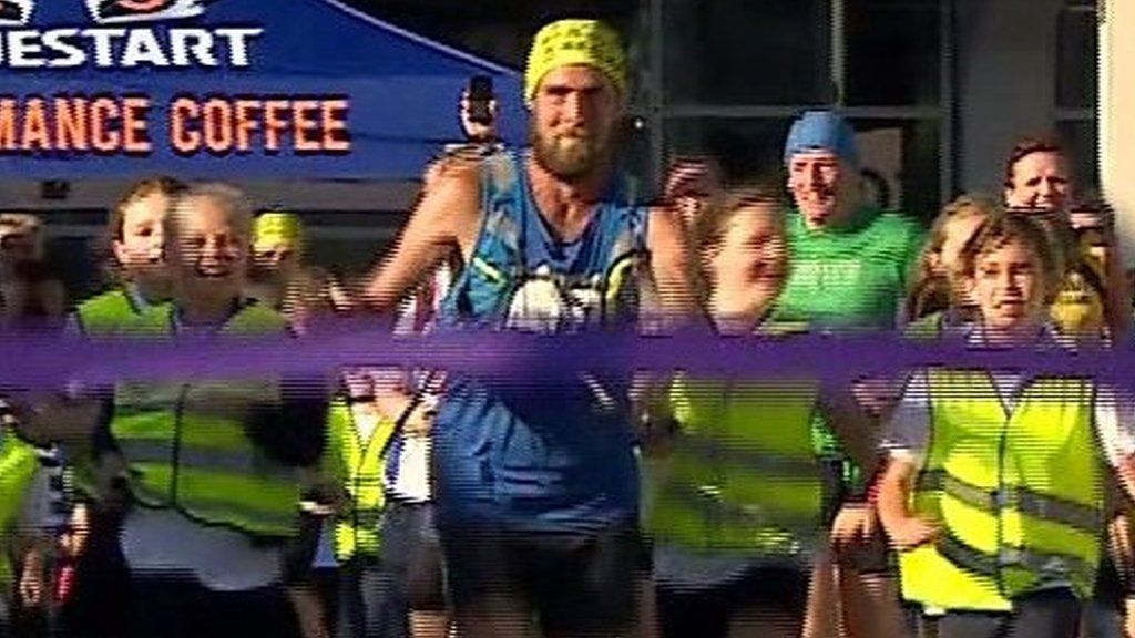 Moment 401 marathon man Ben Smith crosses finish line