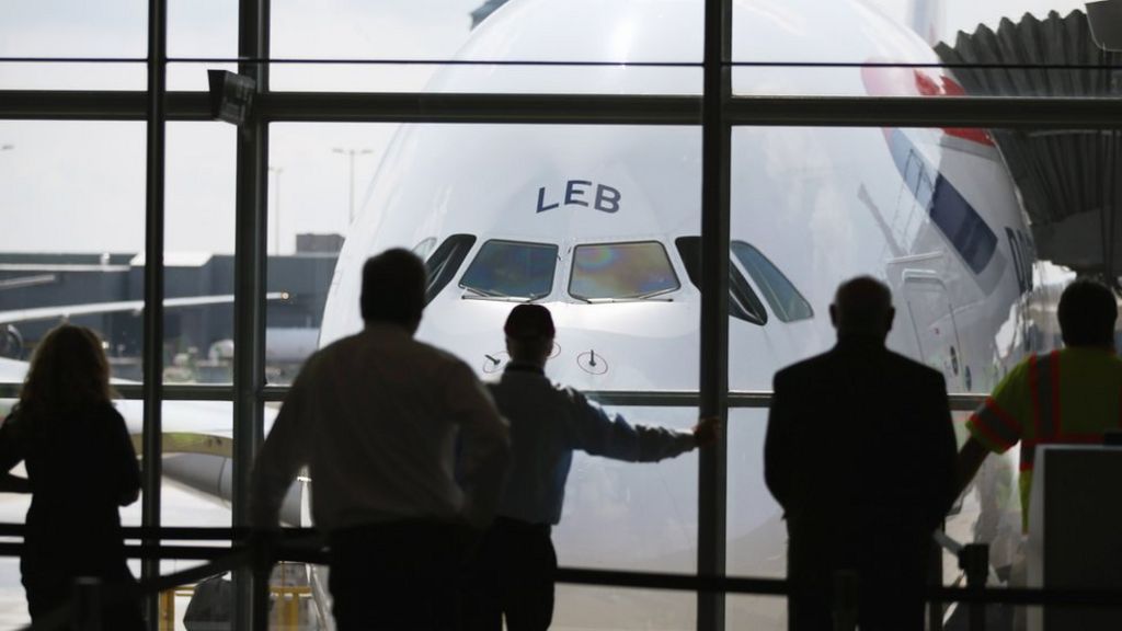 MPs call on government to cut air travel tax by 50%