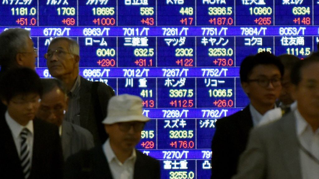 Japan shares up despite Tankan survey