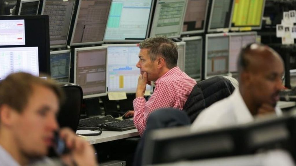 FTSE 100 closes at another record high