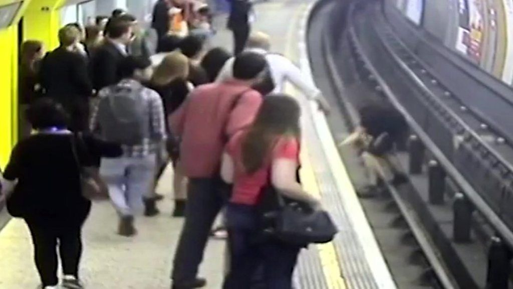 Football fan jailed for pushing man on to Tube track