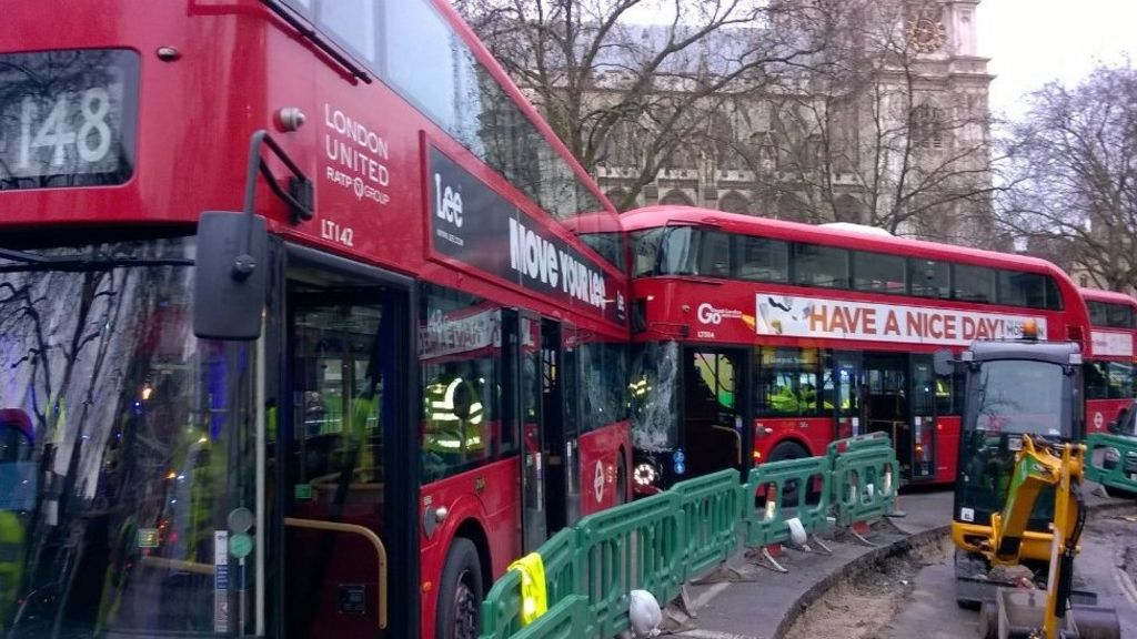 Twelve hurt in three-bus London crash