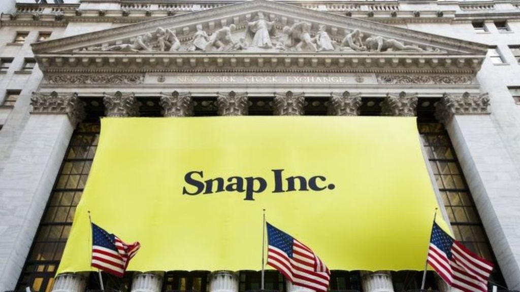Snap slides as Wall Street ends lower