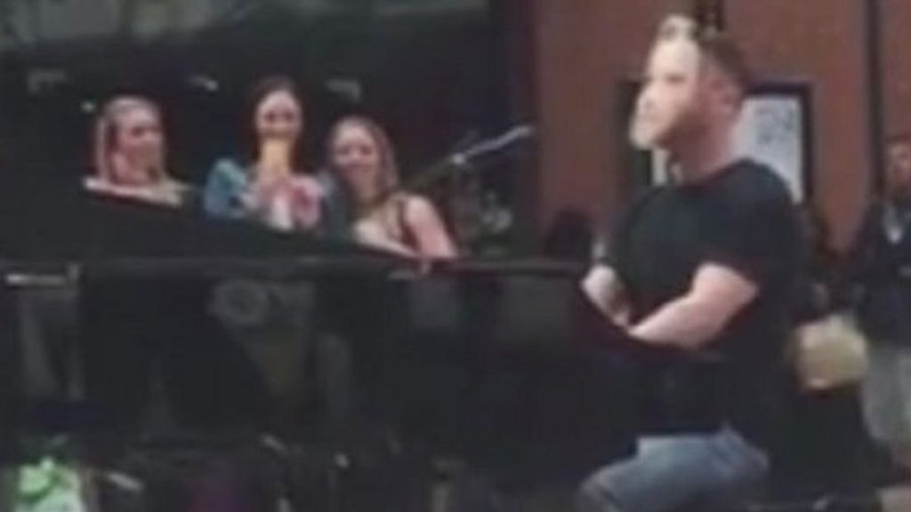 VIDEO: Masked Gary Barlow surprises shoppers