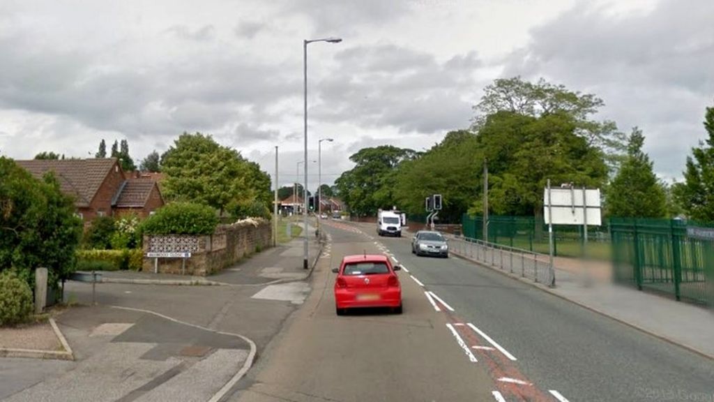 Man held after teenager hit by car