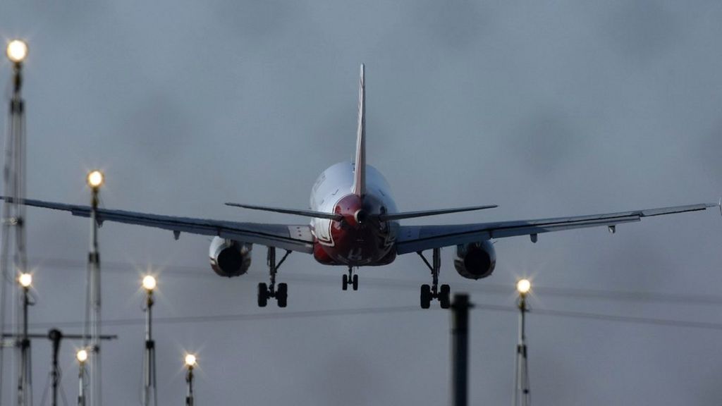 Drunk father and son held after missing Monarch flight