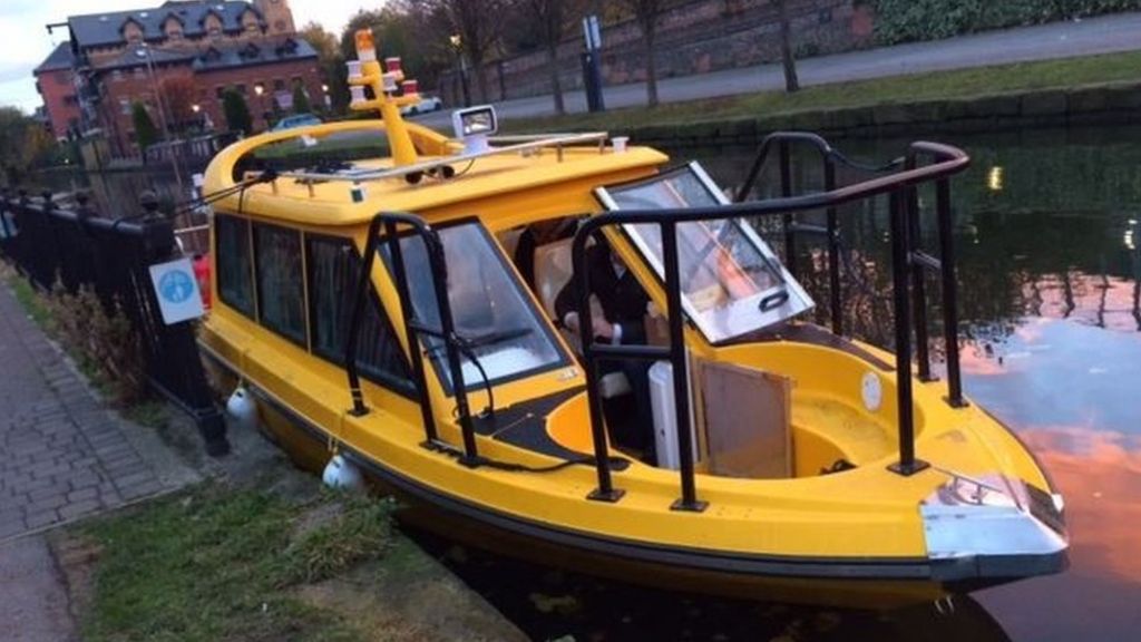 Water taxi launches on Bridgewater Canal in Manchester