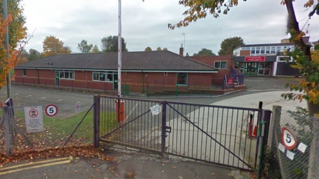 Head teacher charged over abuse images