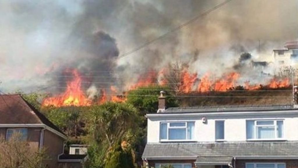 Gorse fire close to homes put out