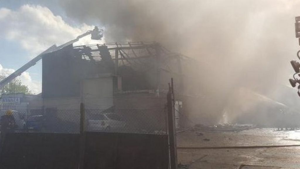 Fire destroys shoe warehouse building