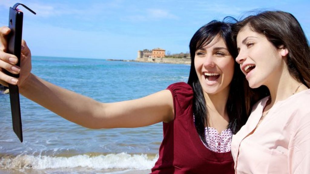 What CAN'T you do in a polling station?