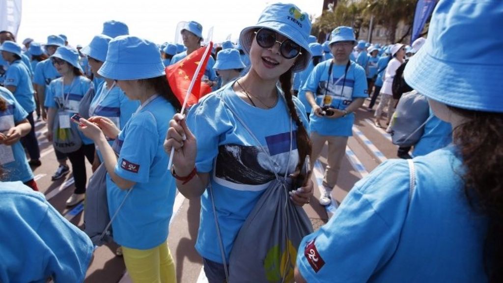 China firm on mass holiday to France
