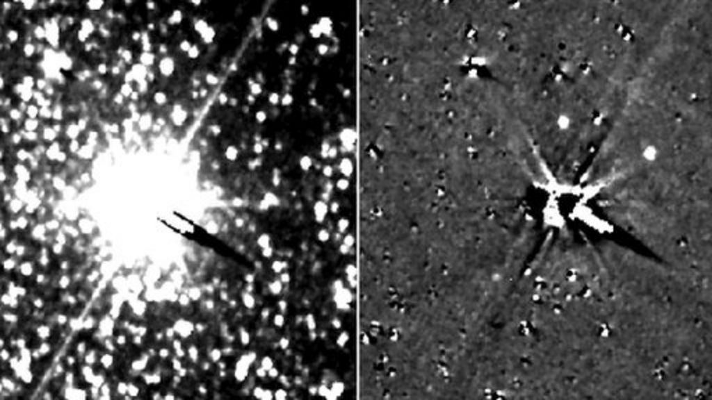 Probe spies Pluto's faint moons