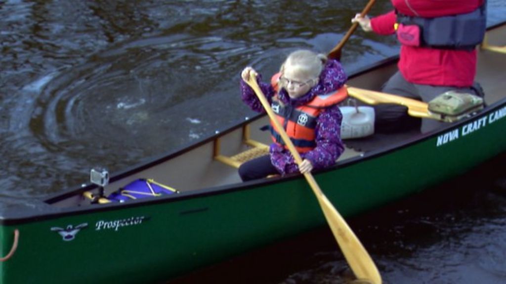 Girl canoes to school each morning BBC News
