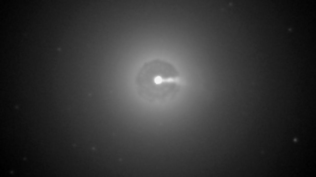 Black hole seen 'playing billiards'