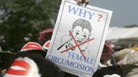 Sign saying why female circumcision