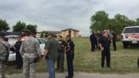 Police respond to the shooting at Lackland
