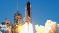 Space shuttle Discovery blasting off in 2006