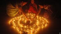 Rows of lighted diyas