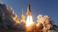 Space shuttle Discovery lifts off