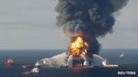 Fire boat response crews battle the blazing remnants of the offshore oil rig Deepwater Horizon, off Louisiana