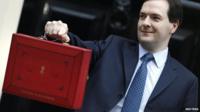 The Chancellor of the Exchequer with his red Budget briefcase
