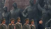 Kim Jong-un (far right) attends the unveiling of statues of Kim il-Sung and Kim Jong-il in Pyongyang, 13 April